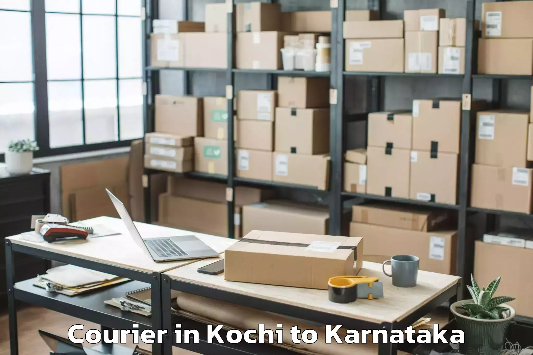 Easy Kochi to Karnataka Janapada Vishwavidya Courier Booking